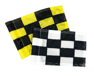 Two golf flags, one black and yellow checkered, the other black and white checkered, on a white background.