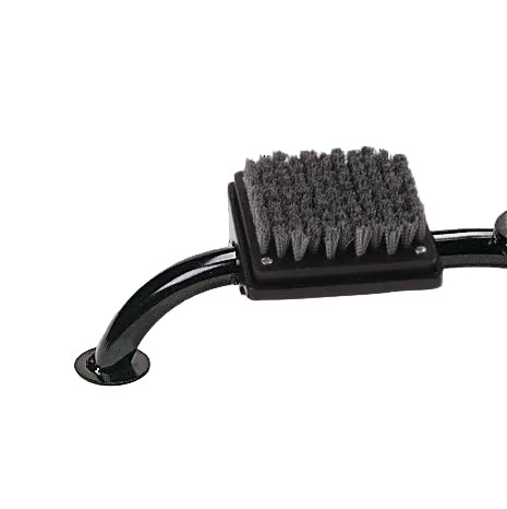 A close-up of a black metal footrest with a rectangular black bristle pad, likely for a massage table or pedicure station, on a light gray background.