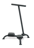 A black metal T-bar floor stand with two brush beds and gray bristles, photographed on a plain white background.