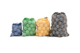 Four mesh bags of golf balls in different colors on a white background