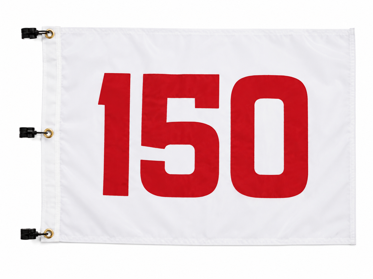 A white rectangular flag with the large red number 150 printed across the front, shown on a plain white background. The left edge has three black grommets with gold rings for hanging.