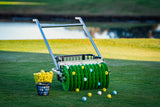 P2 Golf Products Shag Picker on a golf course with balls scattered around.