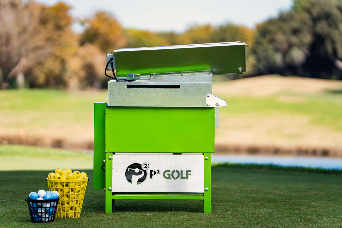 P2 L Golf Ball Washer on a golf course with a blurred background